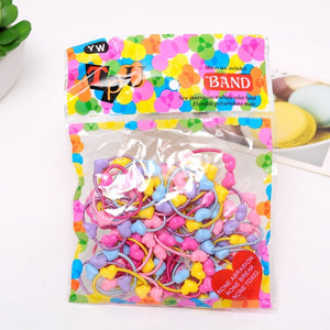 A lot of 50 PCS Hair Rubber Band, 3 CM in Diameter (a little more than one inch).